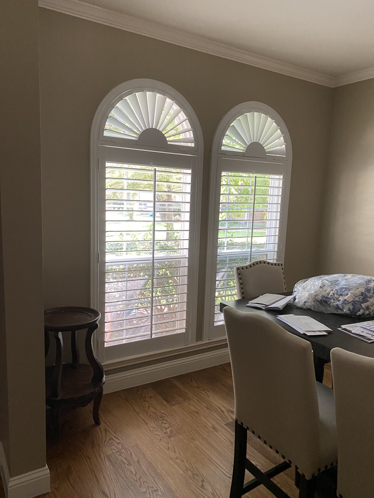 Sunburst arch shutters in a Celina home